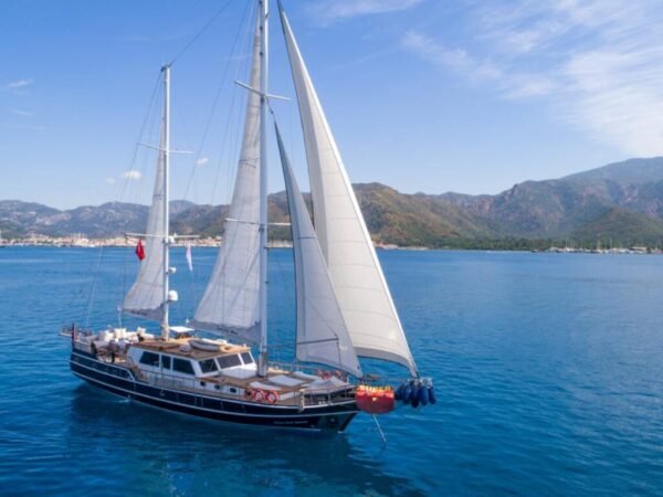 opusyachting_motor_sailer_dea_del_mare_gulet_exterior_full_sails_photo